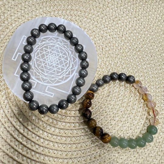 combo of bracelet with selenite tray